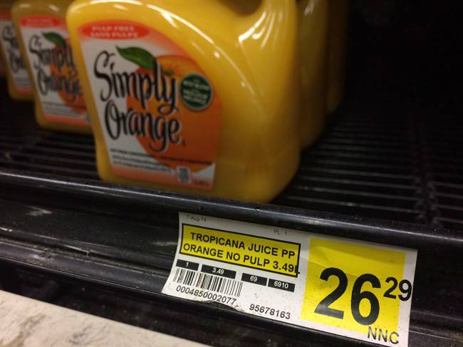Photo of twenty six dollar bottle of orange juice for carbon pricing in the north blog